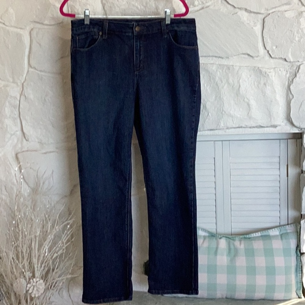 Woman size 14 darker medium shade of jean straight leg with spandex stretch zip